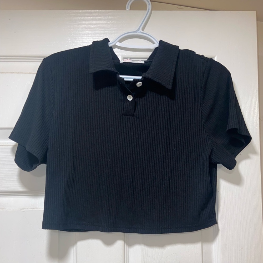Black half button crop top with collar.